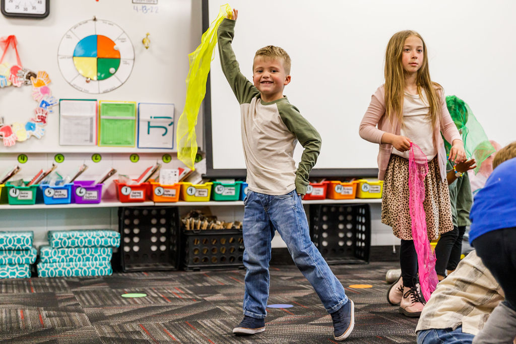 Second-grader dances the plant life cycle and uses the arts to learn core content.