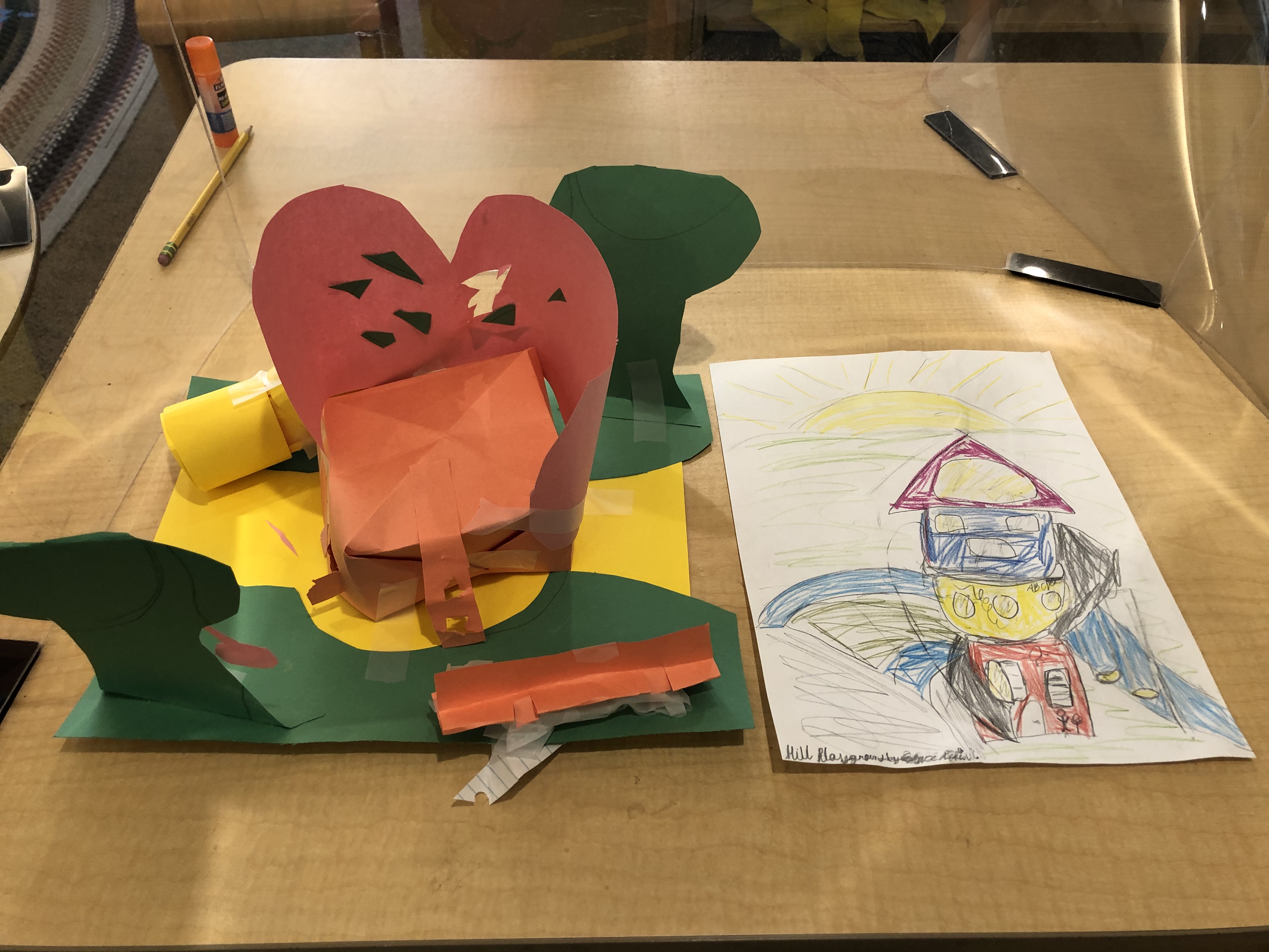 Three-dimensional model of a student's ideal playground and accompanying sketch